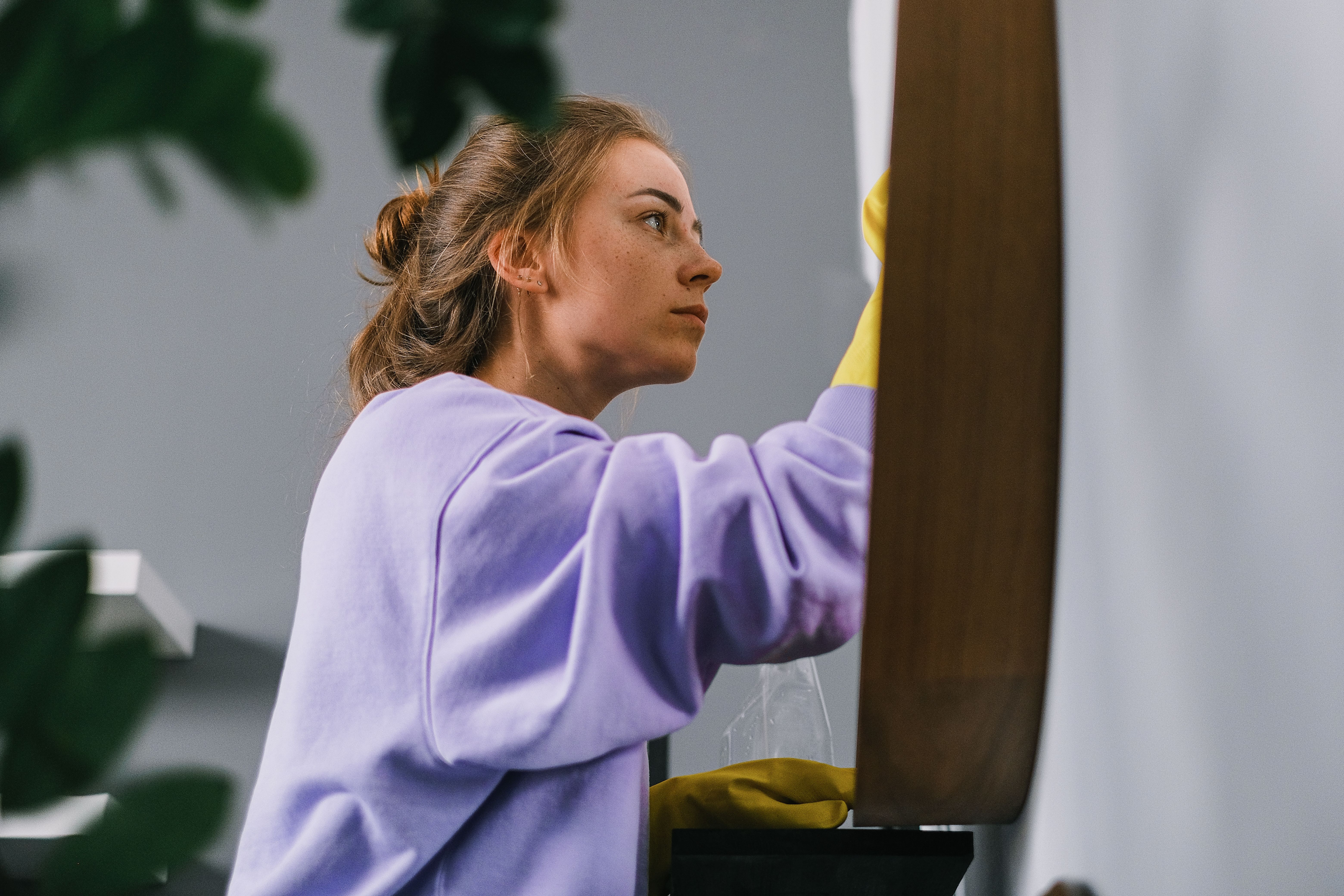 A B&M cleaner at work in a family kitchen